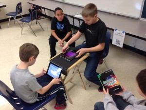 Picture of children recording an audio podcast with ipads